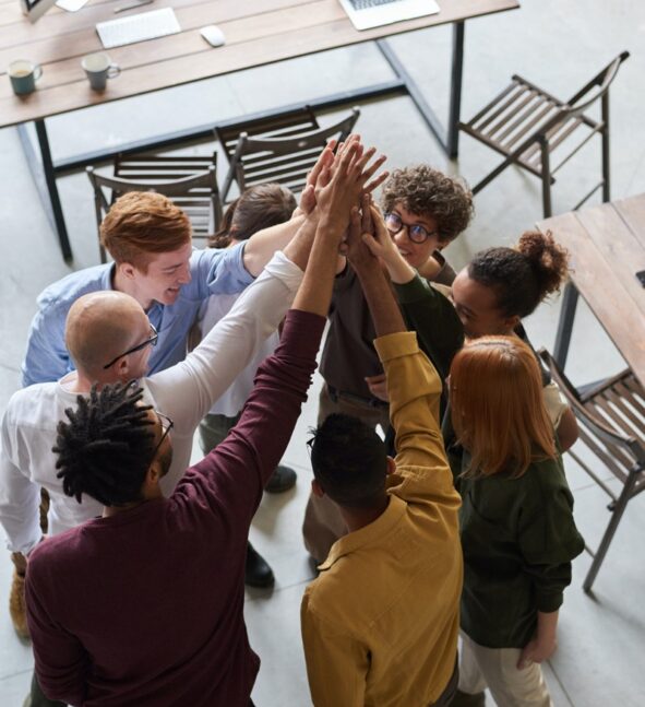 photo-of-people-holding-each-other-s-hands-3184433-(1) team trust